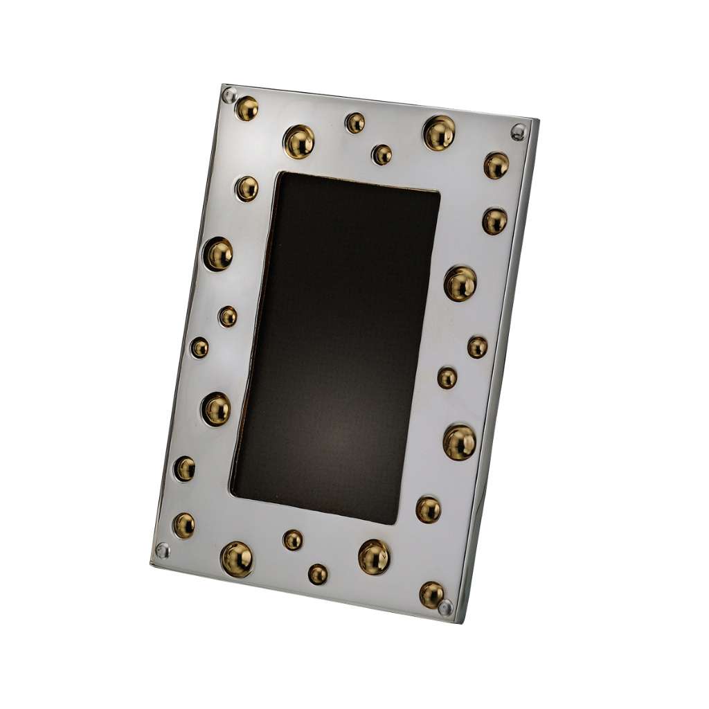 Photo Frame Retro is a silver frame that scatters gold-toned studs, in a mix of sizes, across its bright polished border in a playful – Small