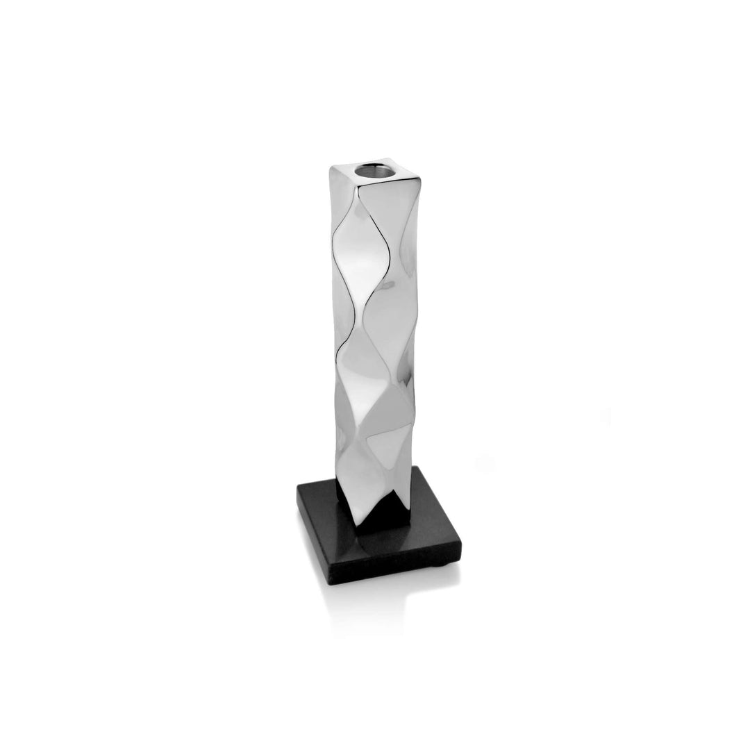 Candle Stand Opulence is a sterling silver candle stand with a clean square column and a sculpted wave running down each face – Small