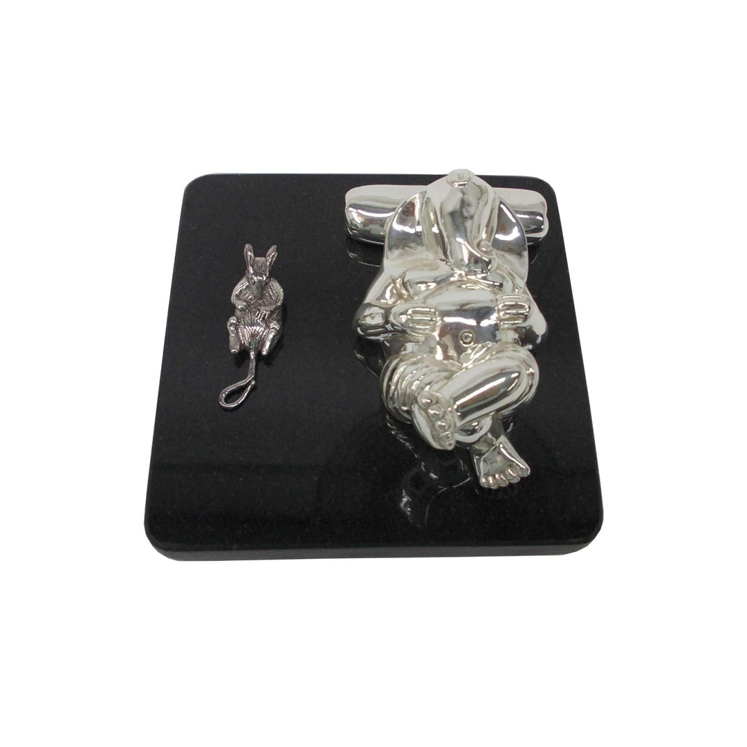 Ganesh Vishram reclines a sterling silver Ganesha idol on one elbow in a relaxed vishram pose – Small